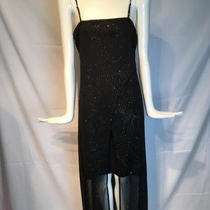 Floor length sleeveless shimmering black ball gown